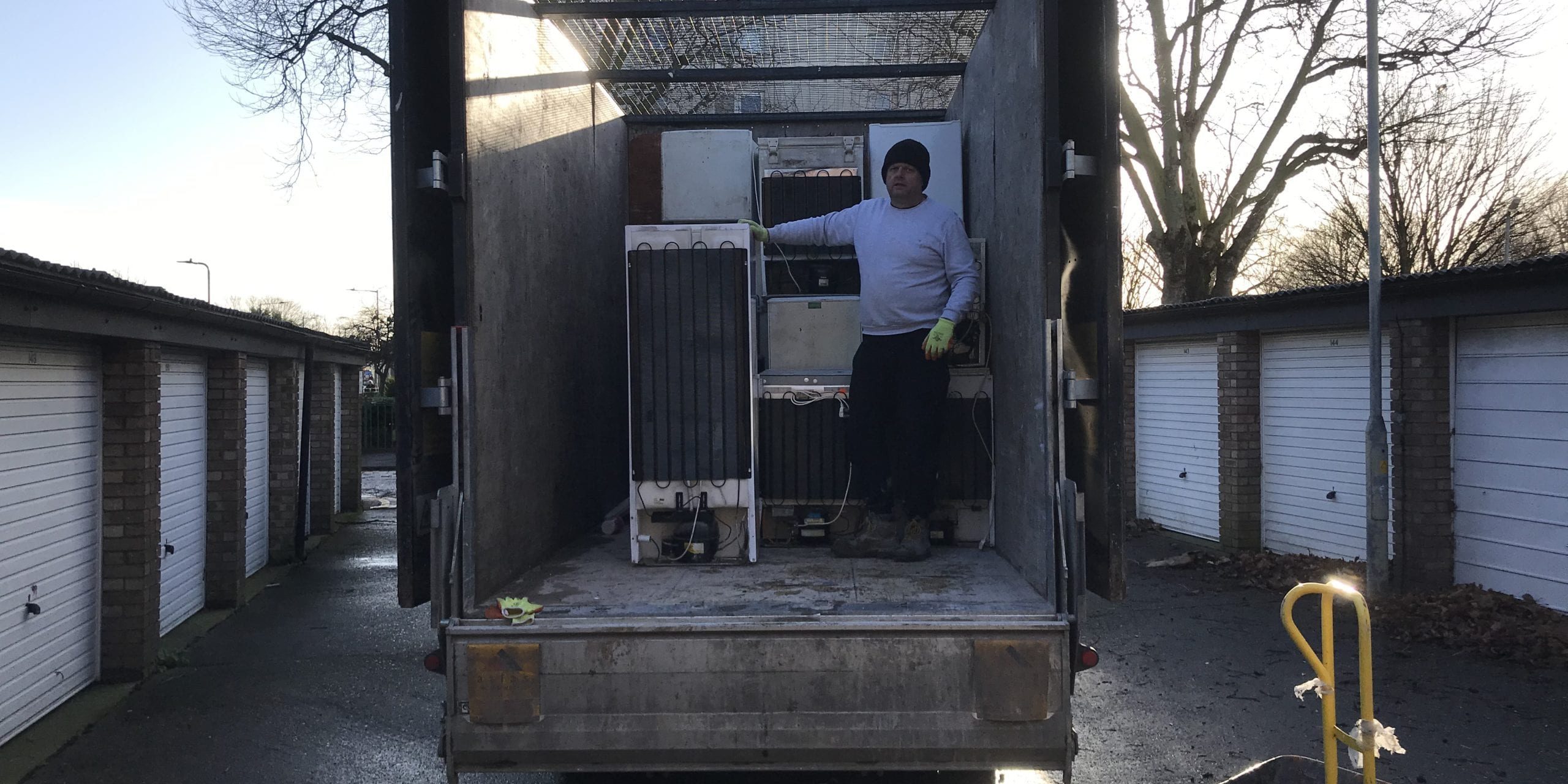 IMG_1707 Man with old fridge freezers on back of lorry