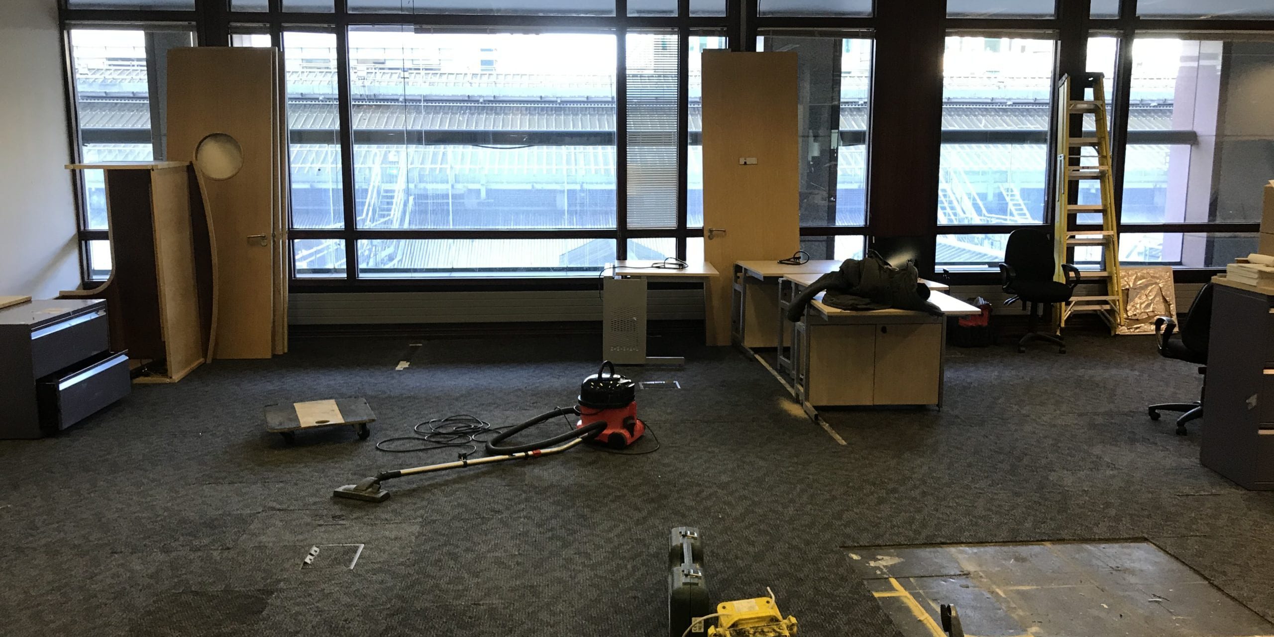 IMG_1724 Office space being cleared of rubbish with desks and doors