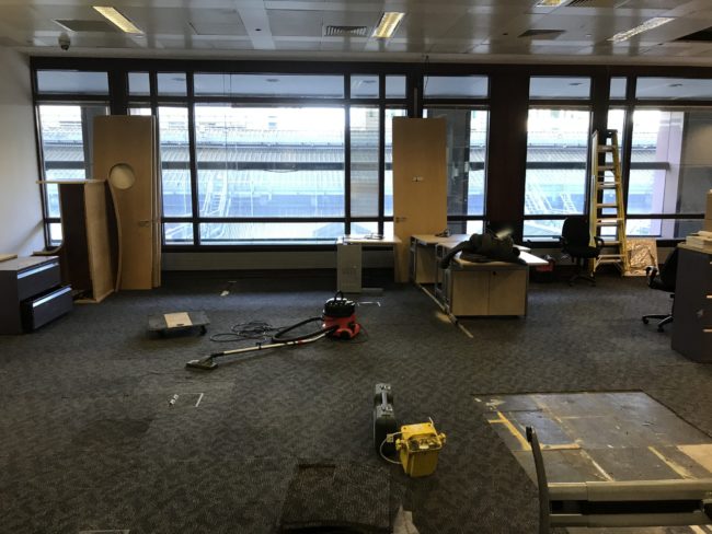 IMG_1724 Office space being cleared of rubbish with desks and doors