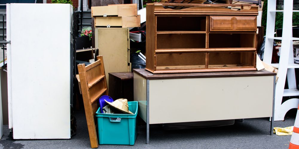 Items,And,Old,Furniture,On,Street,Outside,House,Moving,Day A Guide to Disposing of Large Items Responsibly