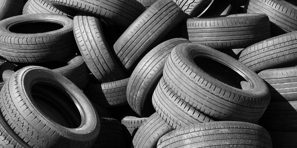 Pile,Of,Old,Used,Automotive,Tires tyres in a junk pile