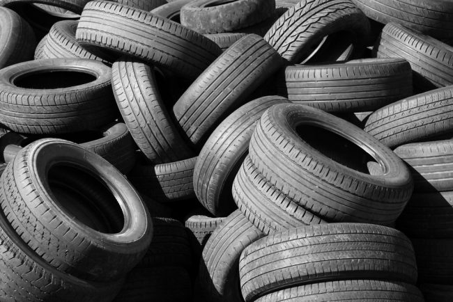 Pile,Of,Old,Used,Automotive,Tires tyres in a junk pile