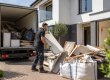 Licensed rubbish clearance team removing builders' waste from a recently renovated home in Essex.